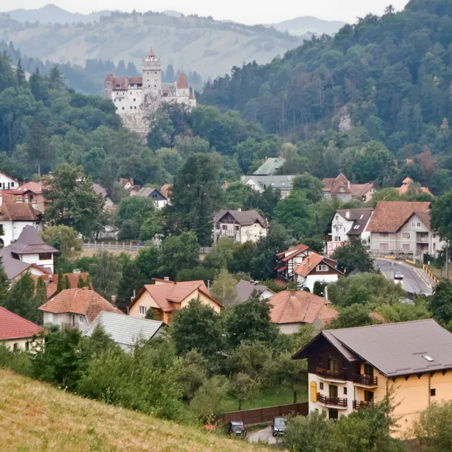 The village of Bran with the castle above the rooftops