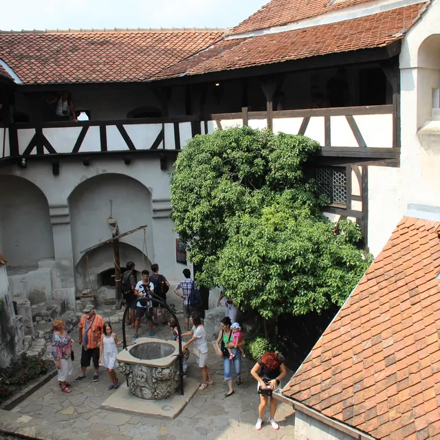 The courtyard well at Bran Castle under the tiered galleries